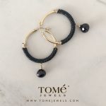 Arracadas GF con piel y piedra colgando
