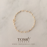 Pulsera con Cuentas Doradas